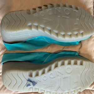 Turquoise blue wedge heel sandals by Fly London